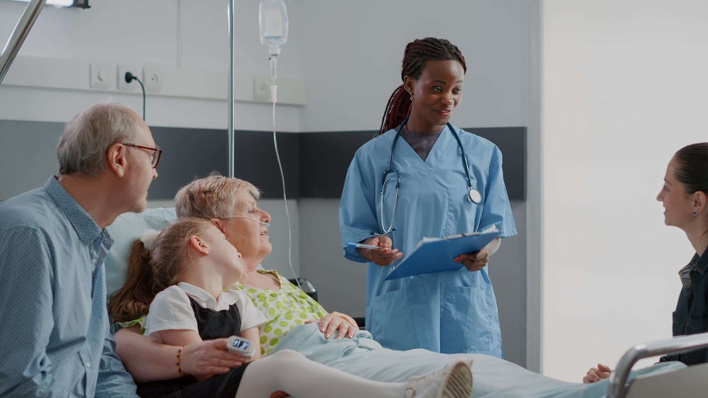 nurse talking to family at hospital-min-1